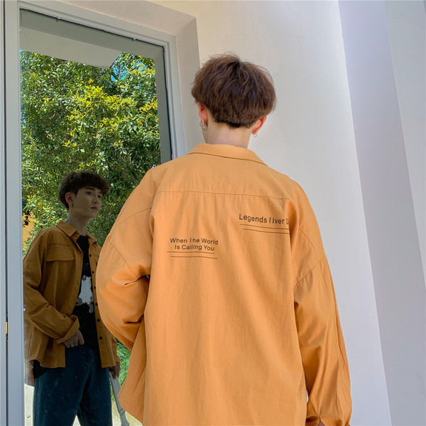 Lezser férfi ing széles modell hosszú ujjakkal és zsebekkel