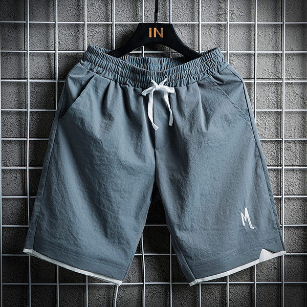 Alkalmi férfi rövidnadrág elasztikus derékkal és hímzéssel