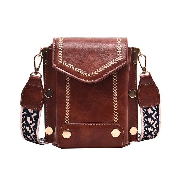 Női bőrtáska széles, színes fogantyúval