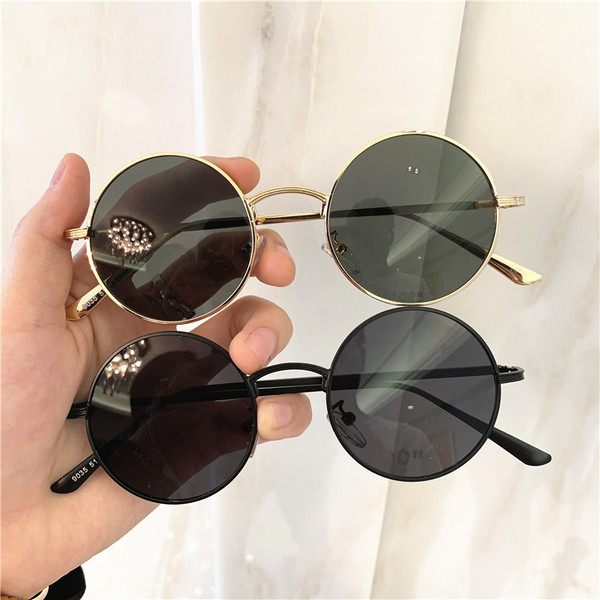 Modern, kerek női napszemüveg vékony kerettel