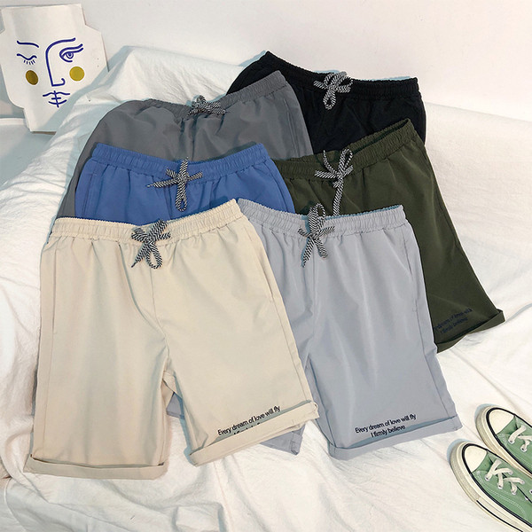 Férfi rövidnadrág gumírozott derékkal és felirattal