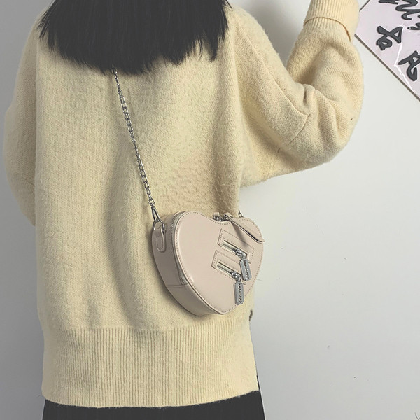 Stílusos női szív alakú műbőr táska