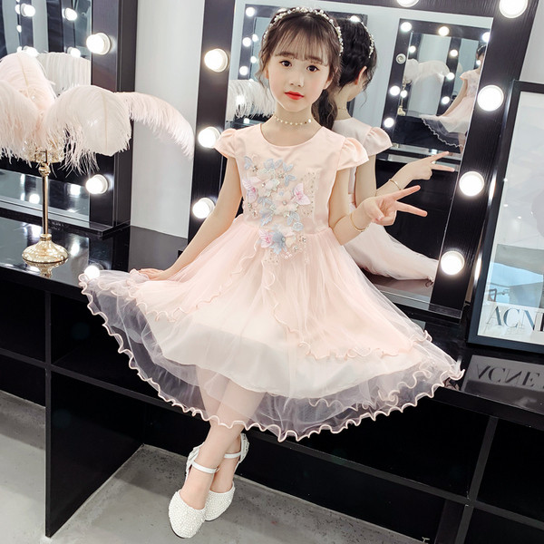 Modern gyerekruha 3D virágokkal és tülllel