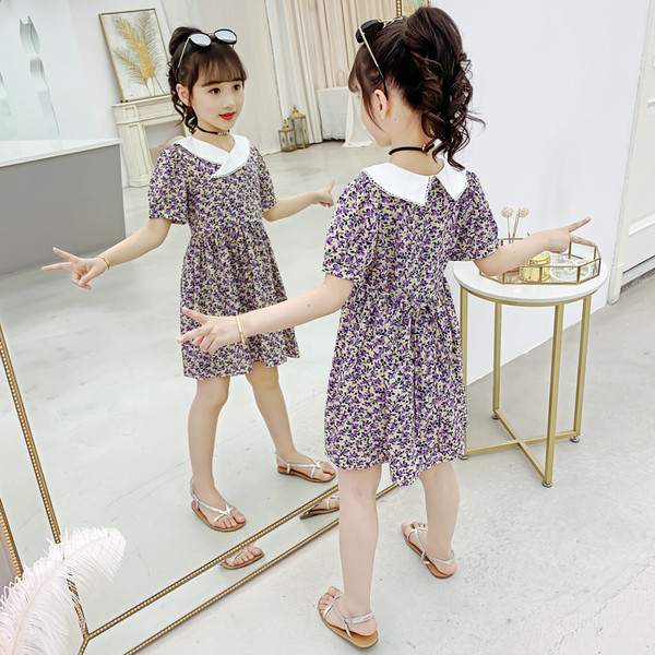 Gyerekruha virágmintával és spitz nyakkivágással