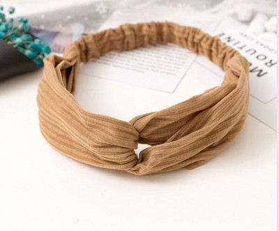 Keresztezett női hajgumi textilből