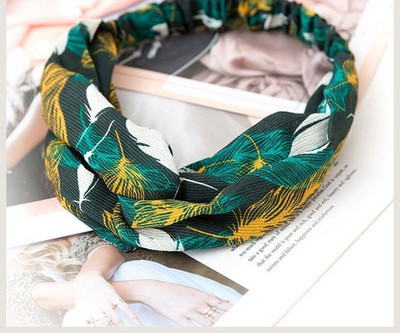 Keresztezett női hajgumi textilből