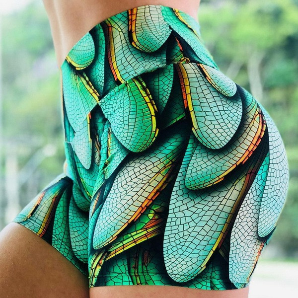 Zaļi sieviešu īsie sporta legingi ar augstu vidukli