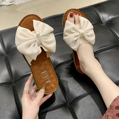 Sieviešu aktuālās čības ar lielu lentīti un pērlēm