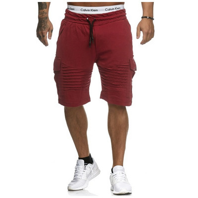 Meeste jooksvad lühikesed püksid lipsude ja küljetaskutega