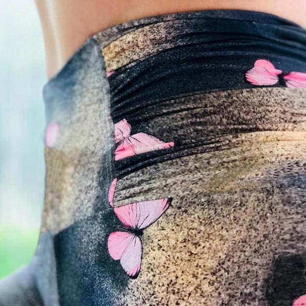 Garie sieviešu sporta legingi ar tauriņu apdruku