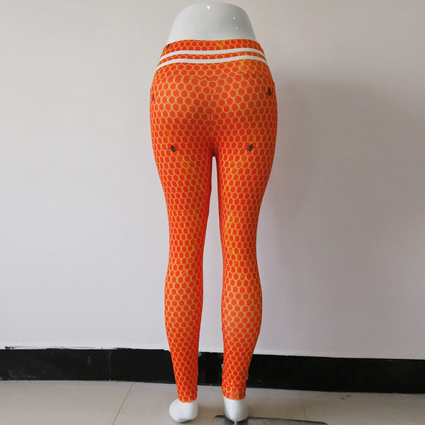 Oranži sieviešu sporta legingi ar augstu vidukli