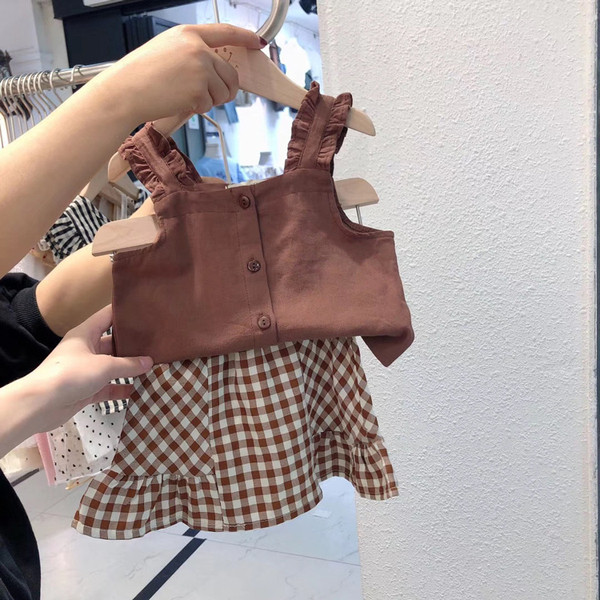 Mūsdienīgs bērnu komplekts meitenēm svārkos un topos