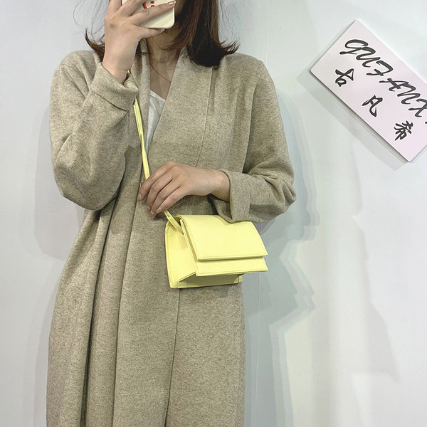 Sieviešu stilīga ādas soma ar metāla rokturi