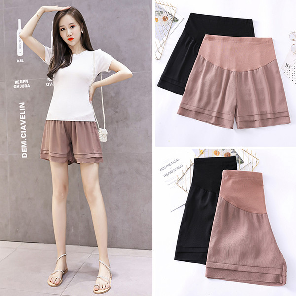 Vasariniai šortai nėščiosioms - plataus modelio