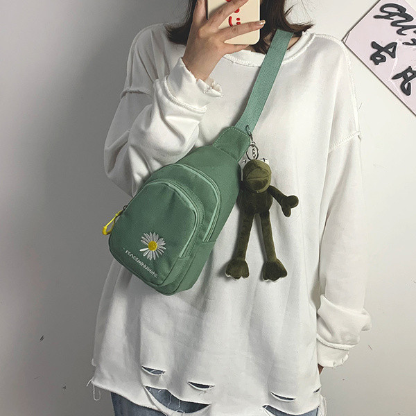 Ležerna ženska torba s vezom u boji