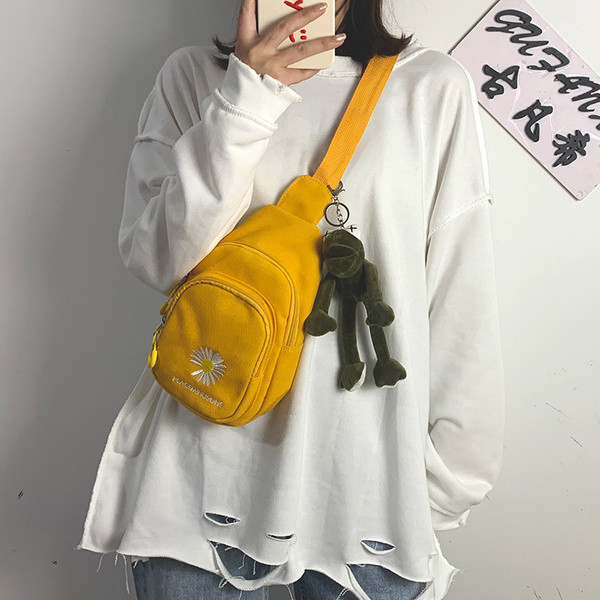 Ležerna ženska torba s vezom u boji