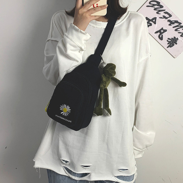 Ležerna ženska torba s vezom u boji