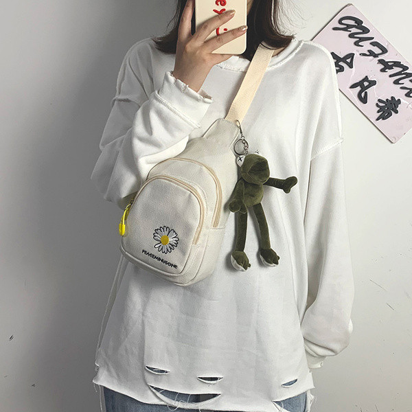 Ležerna ženska torba s vezom u boji