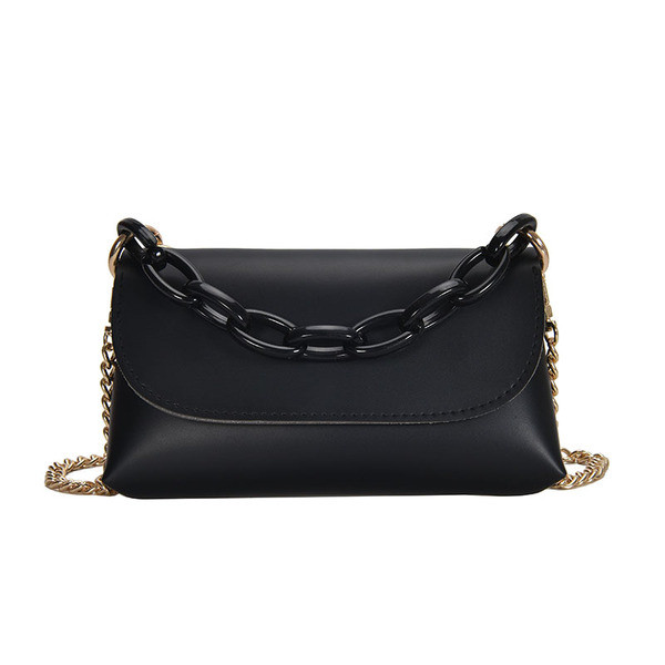 Női bőrtáska rövid és hosszú fém fogantyúval