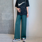 Alkalmi nadrág terhes nők számára széles modell szegéllyel