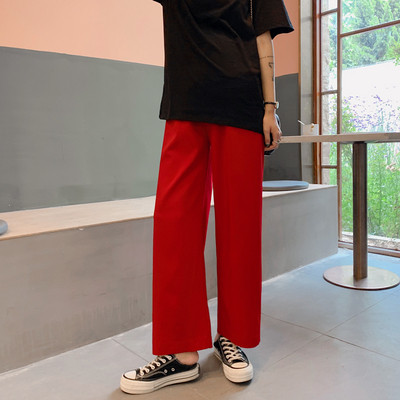 Alkalmi nadrág terhes nők számára széles modell szegéllyel