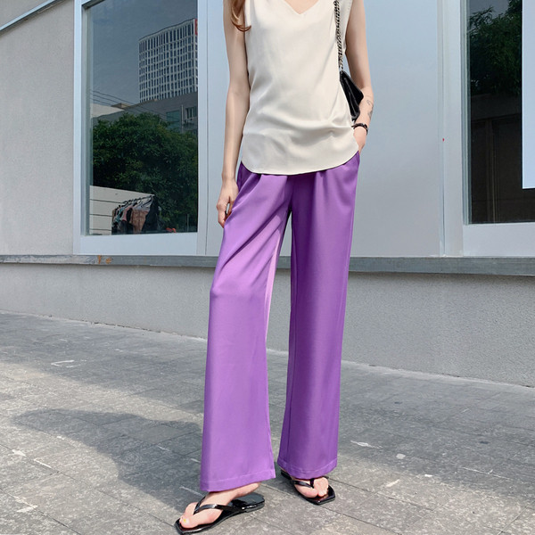 Alkalmi nadrág terhes nők számára széles modell szegéllyel