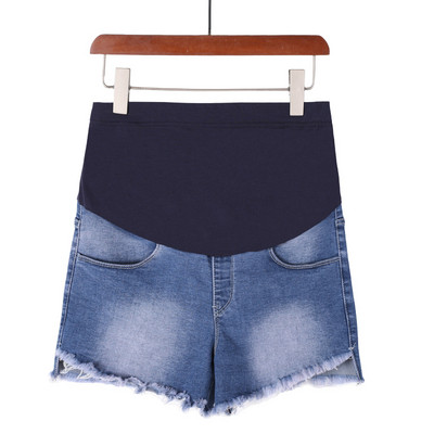 Džinsiniai šortai nėščiosioms su suplyšusiais motyvais