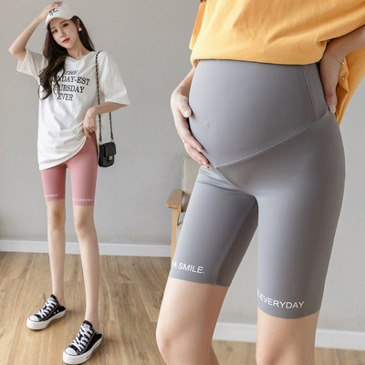 Sport-napi rövid leggings terhes nőknek felirattal