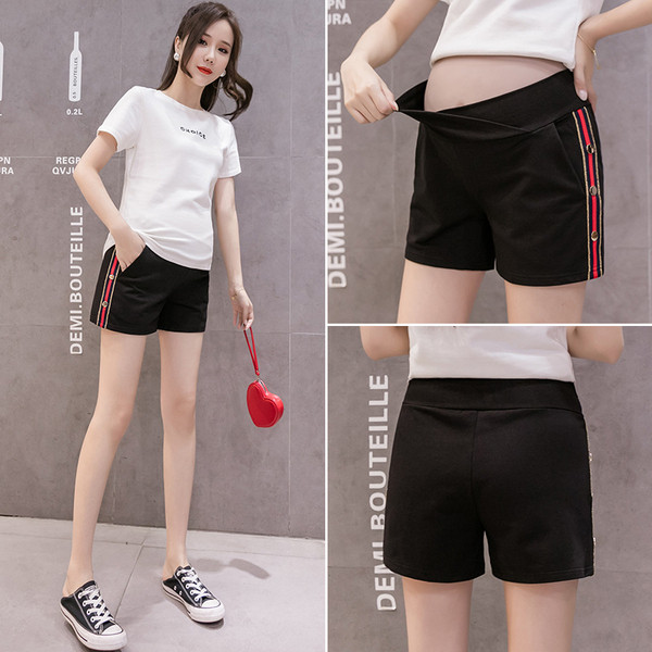 Rövidnadrág terhes nőknek oldalsó szegéllyel és fém elemekkel