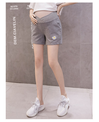 Taskute ja tikanditega vabaajapüksid rasedatele