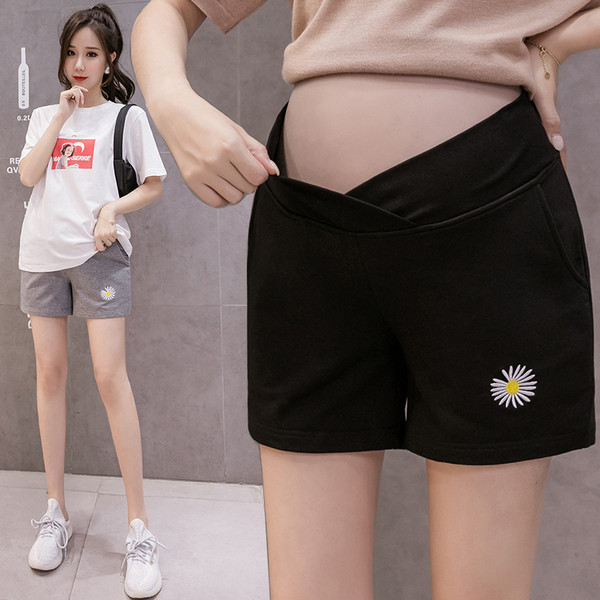 Taskute ja tikanditega vabaajapüksid rasedatele