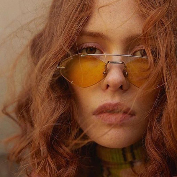 Μοντέρνα γυναικεία στρογγυλά γυαλιά με λεπτά κουφώματα