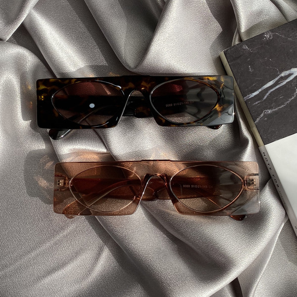 Κομψά γυναικεία γυαλιά ηλίου με στρογγυλούς φακούς