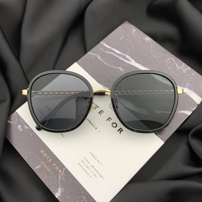 Stílusos női napszemüveg kerek formában, vékony kerettel