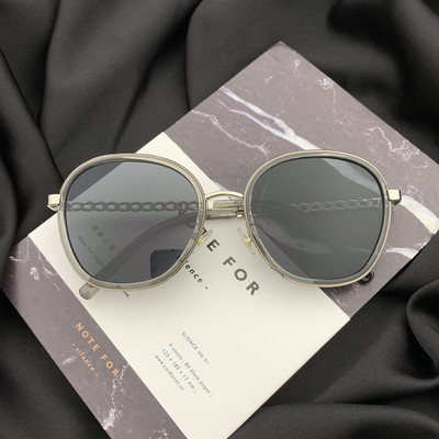 Stílusos női napszemüveg kerek formában, vékony kerettel