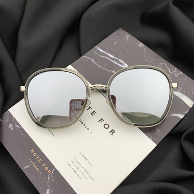 Stílusos női napszemüveg kerek formában, vékony kerettel