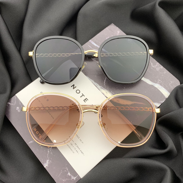 Stílusos női napszemüveg kerek formában, vékony kerettel
