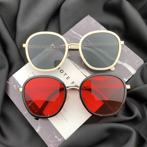 Stílusos női napszemüveg kerek formában, vékony kerettel