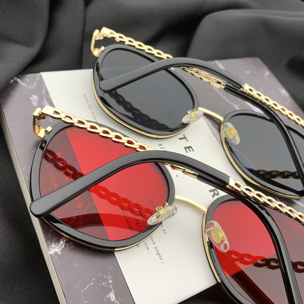 Stílusos női napszemüveg kerek formában, vékony kerettel