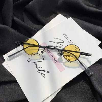 Γυναικεία γυαλιά  με λεπτά κουφώματα με στρογγυλούς φακούς