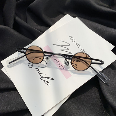 Γυναικεία γυαλιά  με λεπτά κουφώματα με στρογγυλούς φακούς