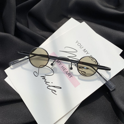 Γυναικεία γυαλιά  με λεπτά κουφώματα με στρογγυλούς φακούς