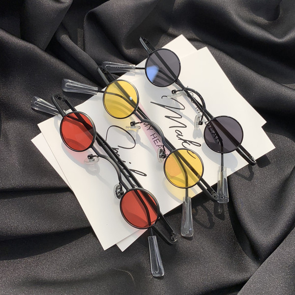 Γυναικεία γυαλιά  με λεπτά κουφώματα με στρογγυλούς φακούς