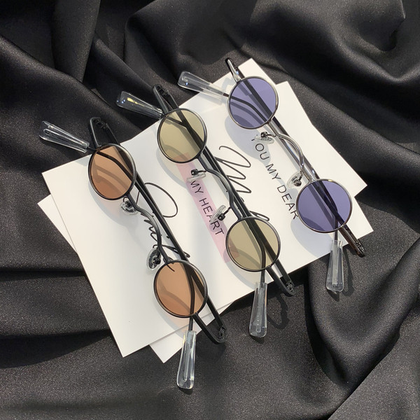 Γυναικεία γυαλιά  με λεπτά κουφώματα με στρογγυλούς φακούς