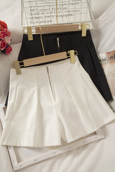 Női széles nadrág cipzárral és magas derékkal