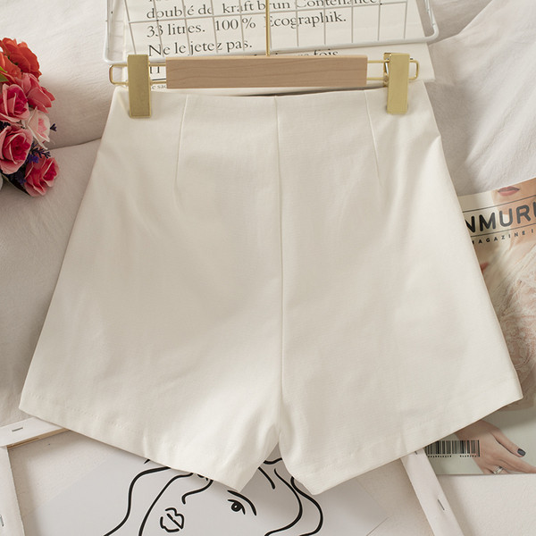 Női széles nadrág cipzárral és magas derékkal