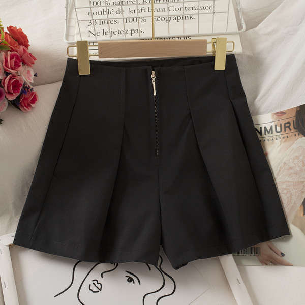 Női széles nadrág cipzárral és magas derékkal