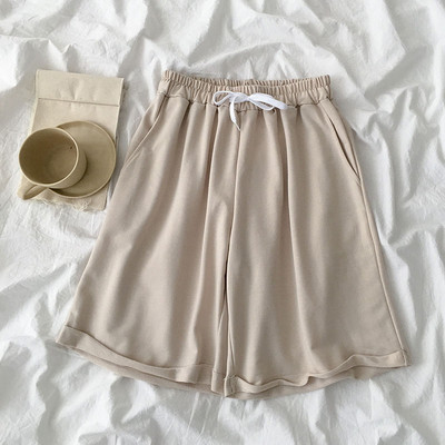 Vabaaja püksid lipsu ja elastse vöökohaga