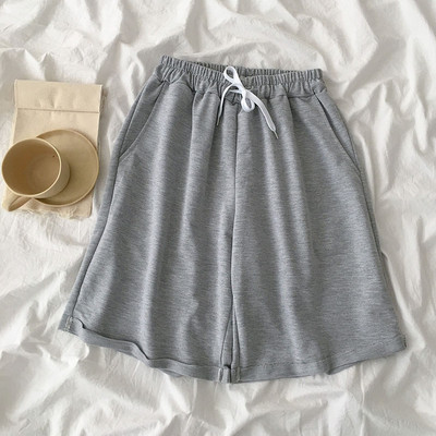 Vabaaja püksid lipsu ja elastse vöökohaga