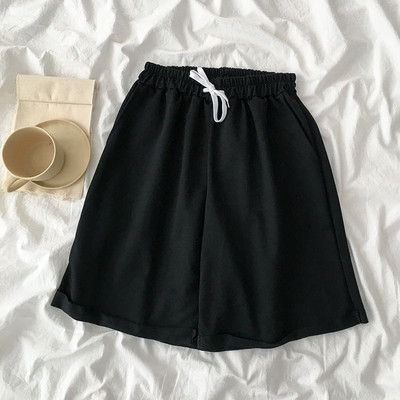 Vabaaja püksid lipsu ja elastse vöökohaga